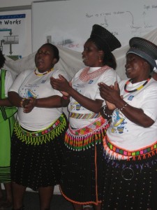 Impiloyethu members sing about the importance of health and hygiene